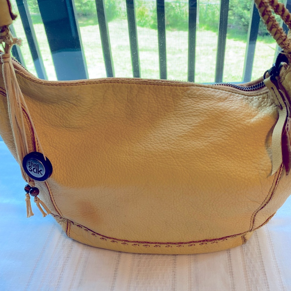 The Sak soft yellow shoulder bag.